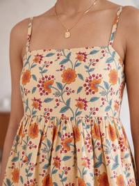 Women Cream Floral Print Peplum Top with Spaghetti Straps 3